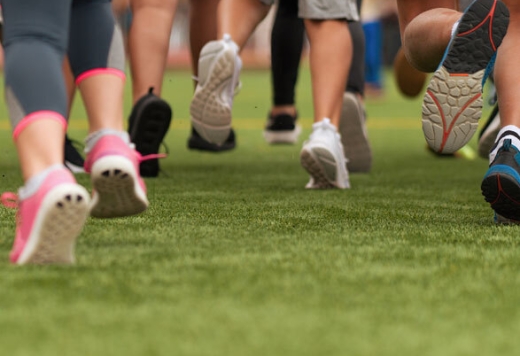Image showing a group of young children running