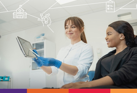 nurse looking at tablet with patient